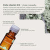 Vitamin D3 bottle with lichen background and product details.